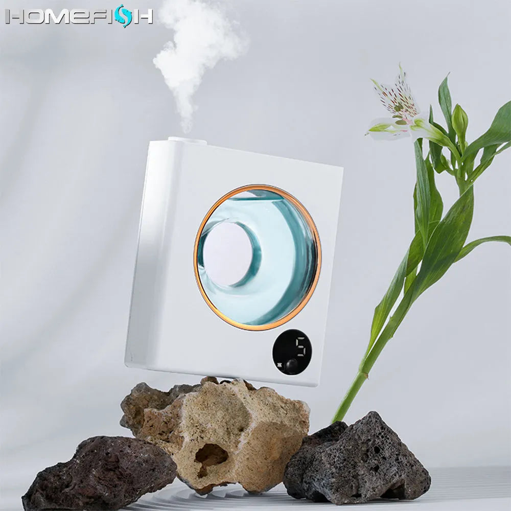 Small white automatic aromatherapy machine with wall-mounted design.