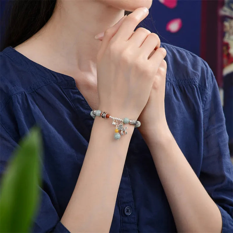 Natural emerald jade vintage bracelet with alloy fittings and retro styling