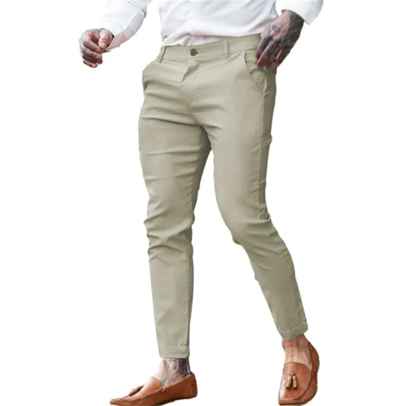 Men's slim fit pencil trousers in cotton twill fabric with stretch, showing zipper fly and mid-waist design