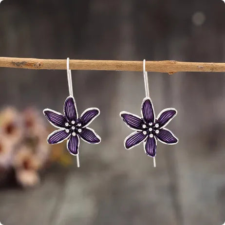Purple flower-shaped alloy earrings with electroplated finish and retro design