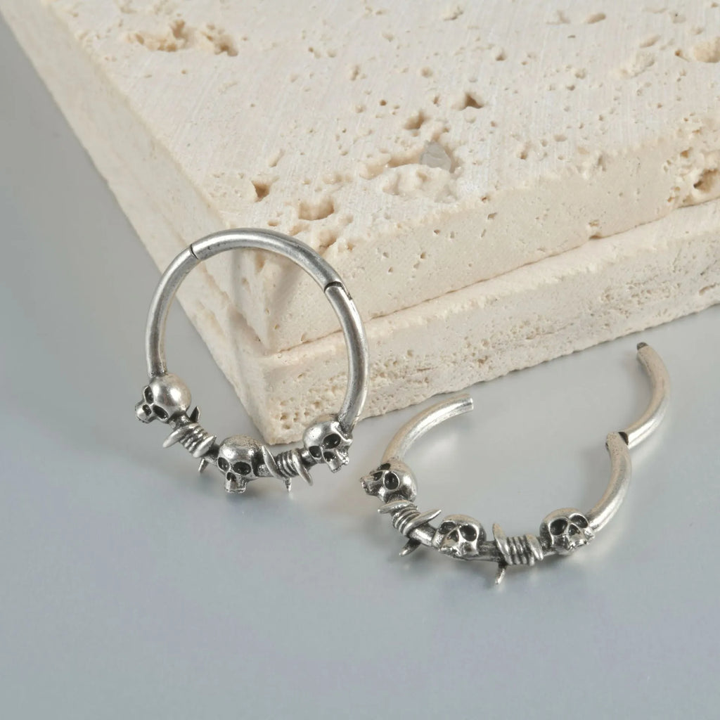 Copper ghost head punk earrings in antique silver and ancient gold finishes