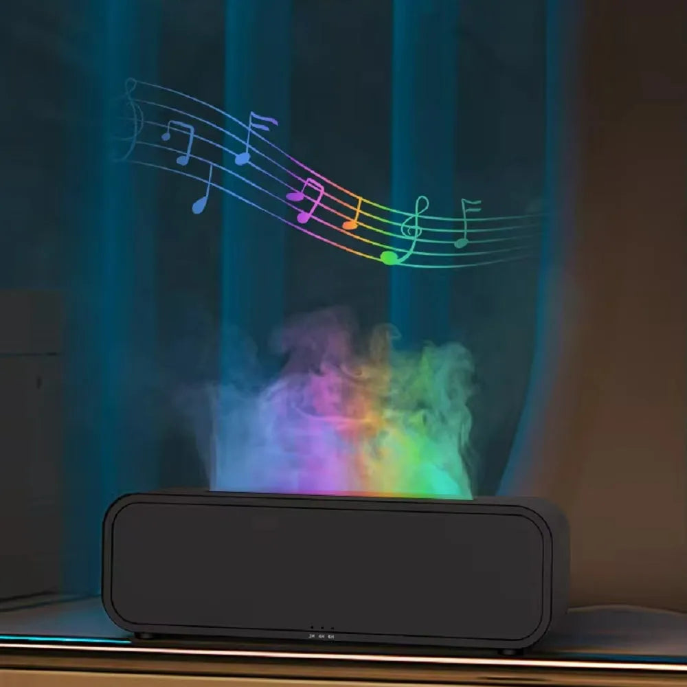Black aromatherapy diffuser with colour-changing lights and remote control on table