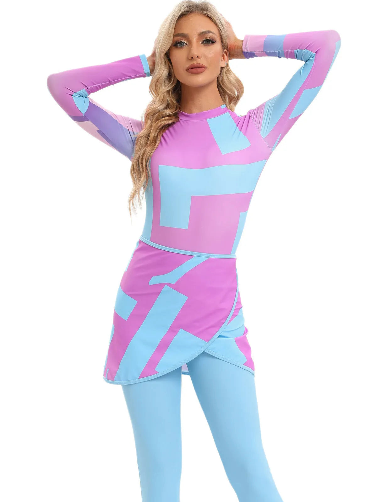 Muslim conservative three-piece swimsuit set with long sleeves and a matching apron in a blue print pattern.