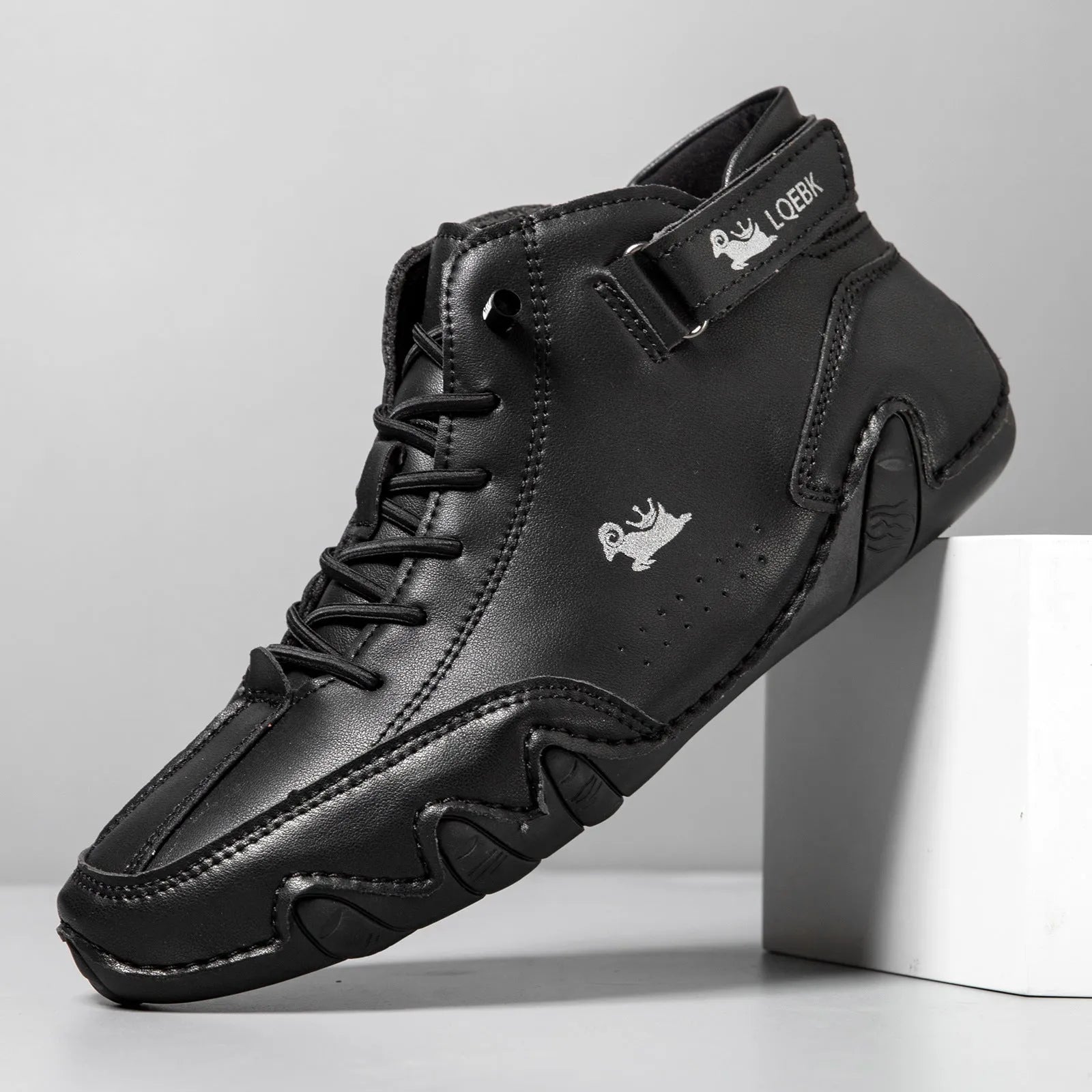 Men's brown octopus-design high-top Martin boots with rubber sole and sewn accents.