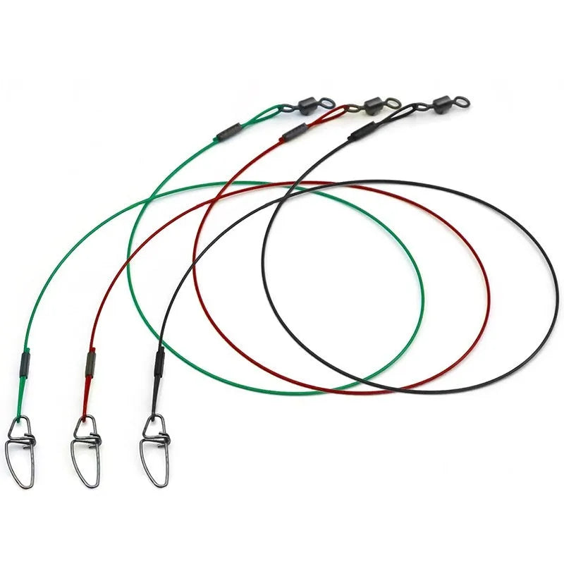 Ten green steel wire double buckle fishing leader pins laid out, each 54 cm long.
