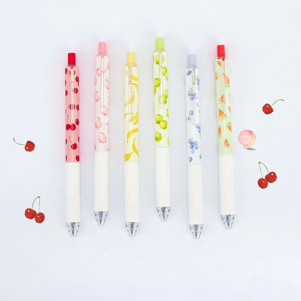 Three fruit-scented press-action pens with plastic barrels and black 0.5mm refills.