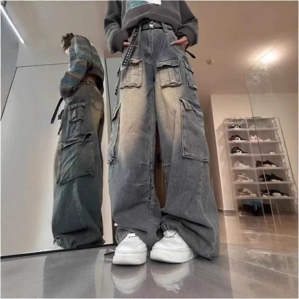 Loose fit multi-pocket distressed denim jeans in light blue colour with street hipster styling