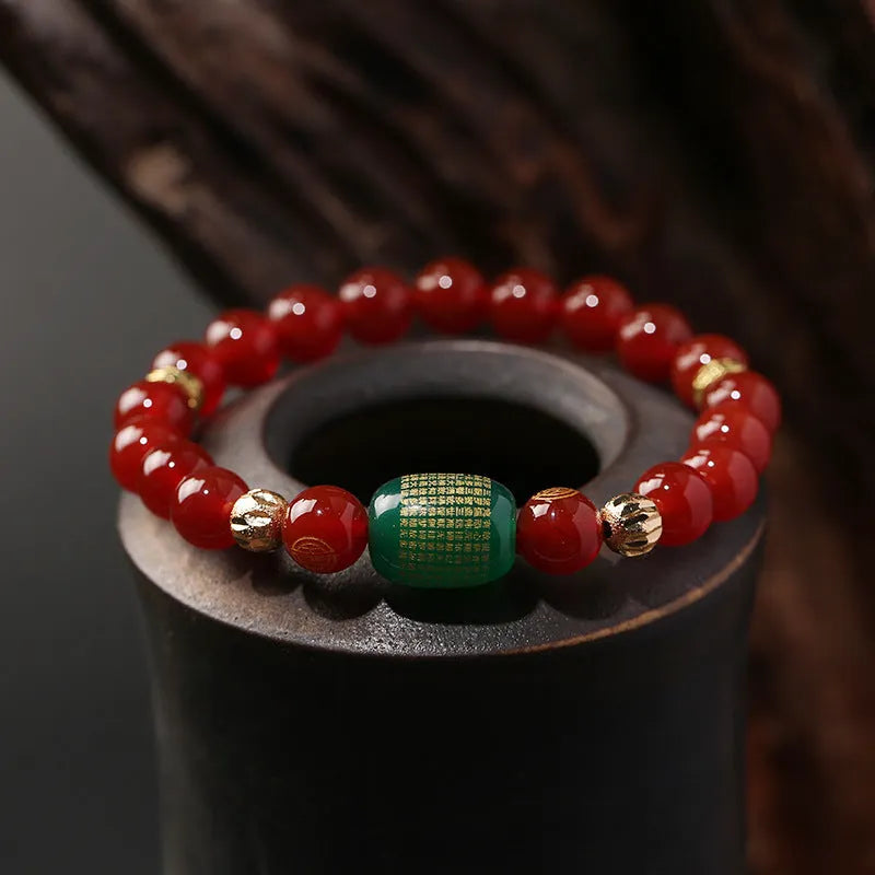 Adjustable unisex Guanyin agate bracelet with auspicious patterns, shown in green and red stone options.