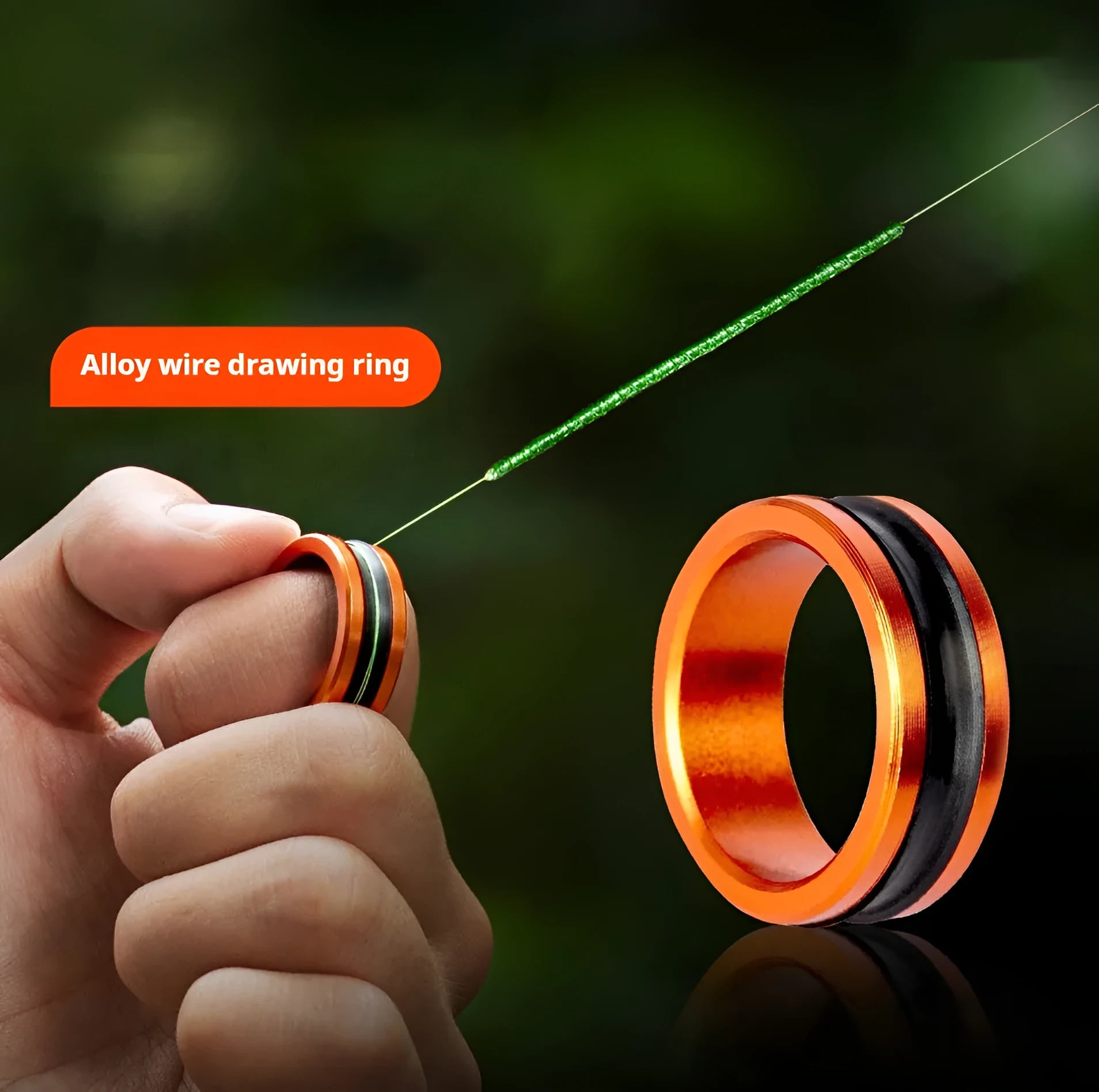 Orange and silver alloy fishing hand guard pull loop with non-slip surface