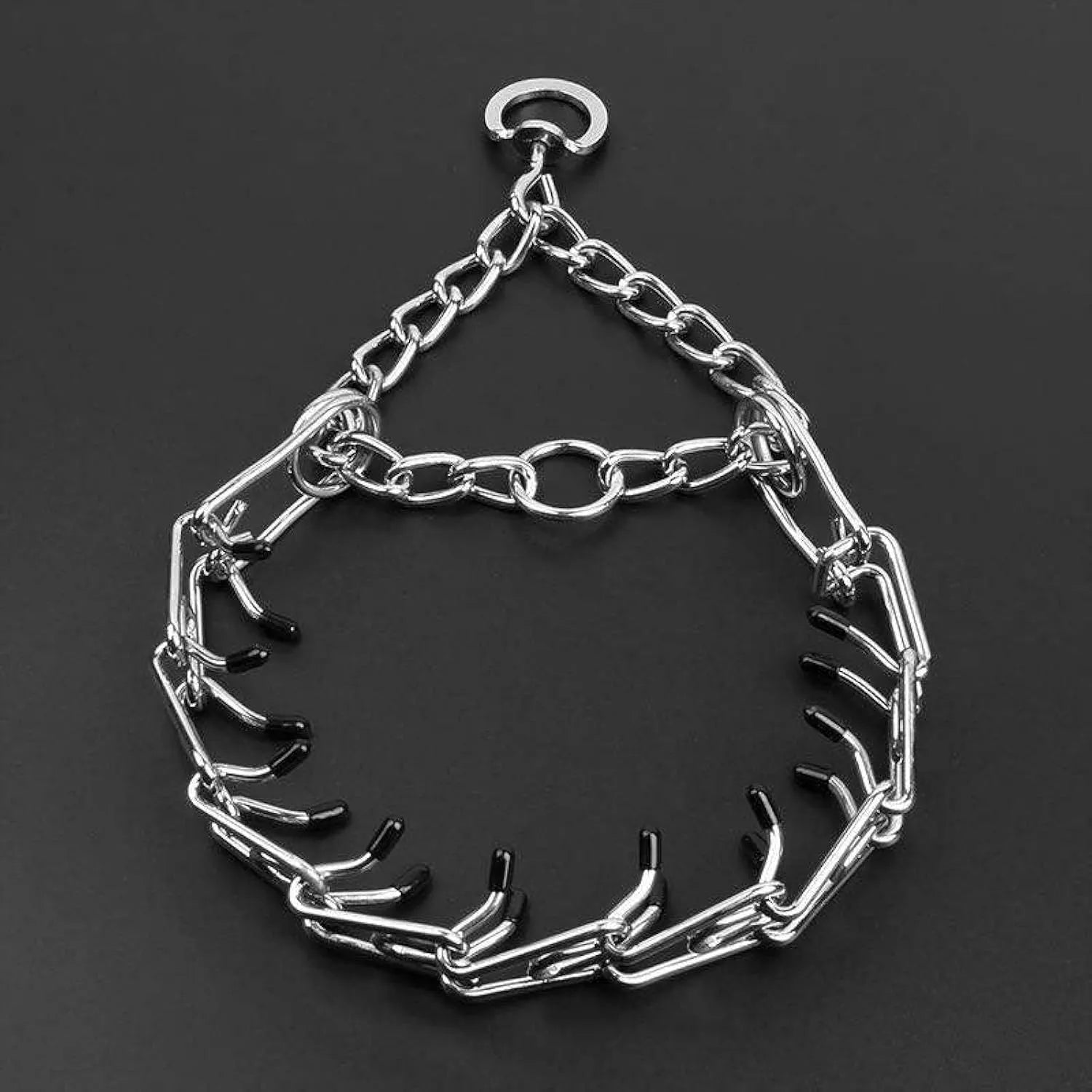 Stainless steel dog pinch training collar with round links and rubber tips, shown adjustable for medium or large breeds.
