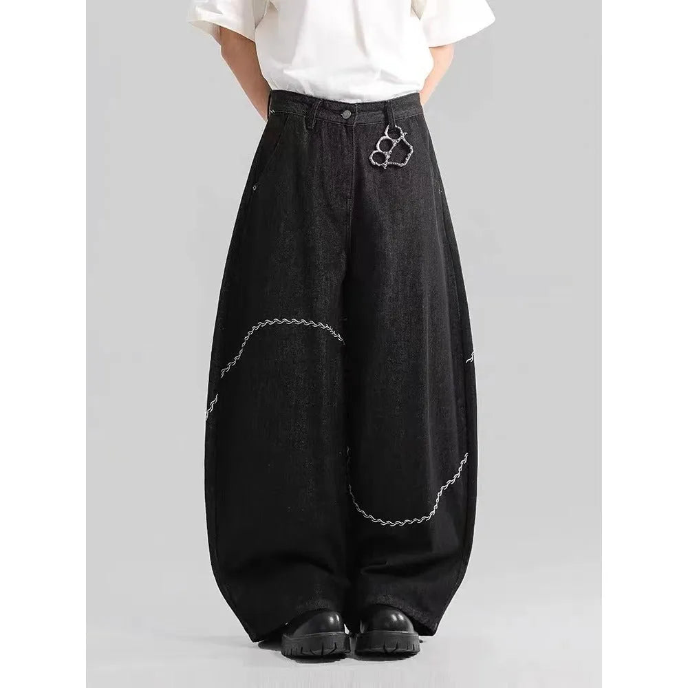Black straight-leg denim trousers with mid waist and zip fly on mannequin