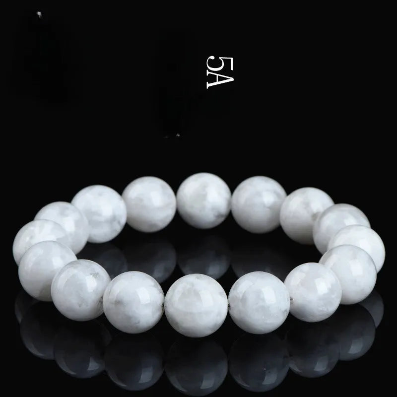 Natural crystal women's bracelet with blizzard snowflake round beads and geometric design featuring Ruyi Xiangyun elements