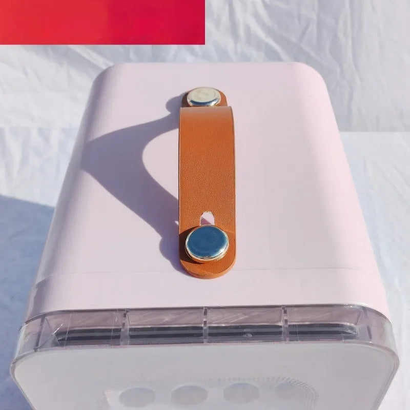 Pink mini refrigerator with transparent door showing 6L capacity for car and home hot and cold use