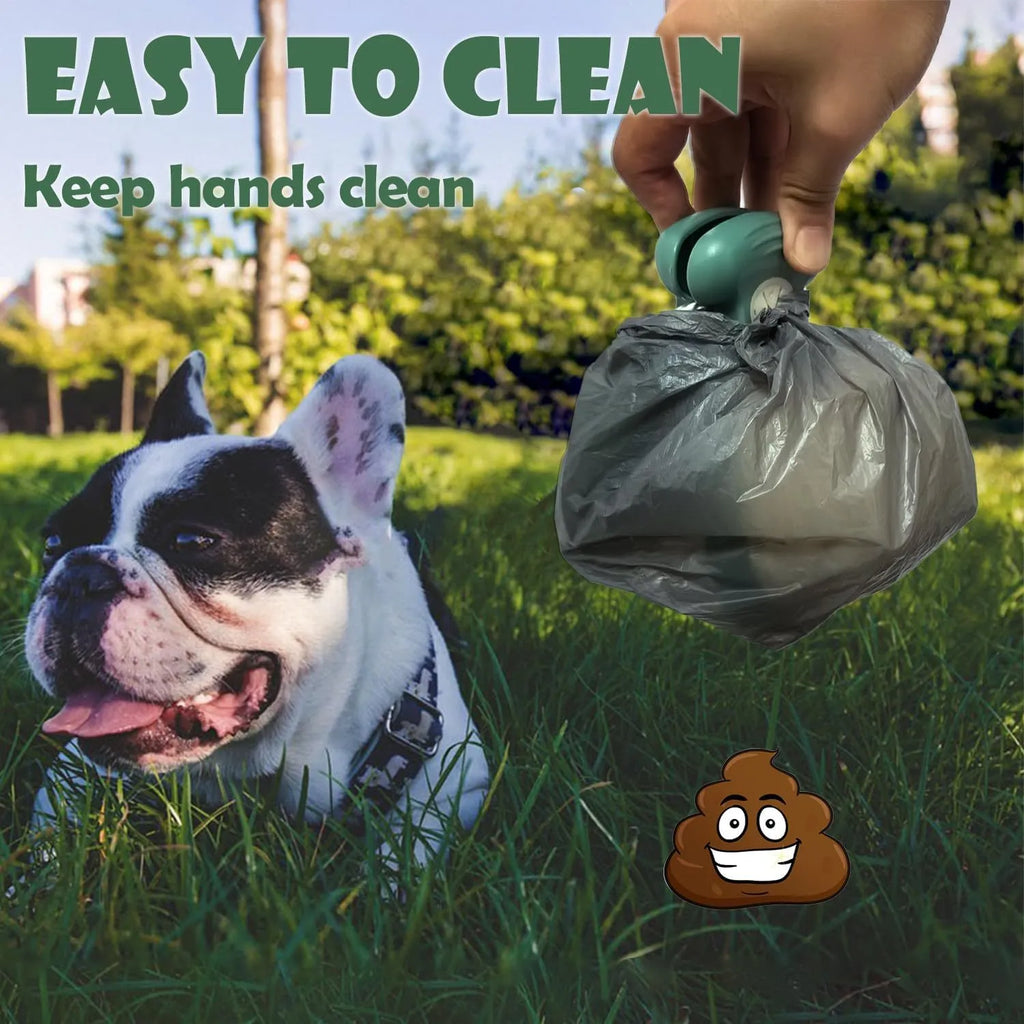Portable handheld pooper scooper with integrated waste bag dispenser and carabiner clip attachment