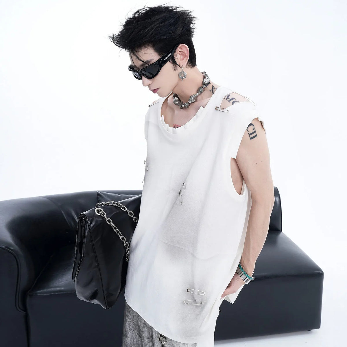 Men's black sleeveless t-shirt vest with irregular cutting and ripped detailing, round neck collar
