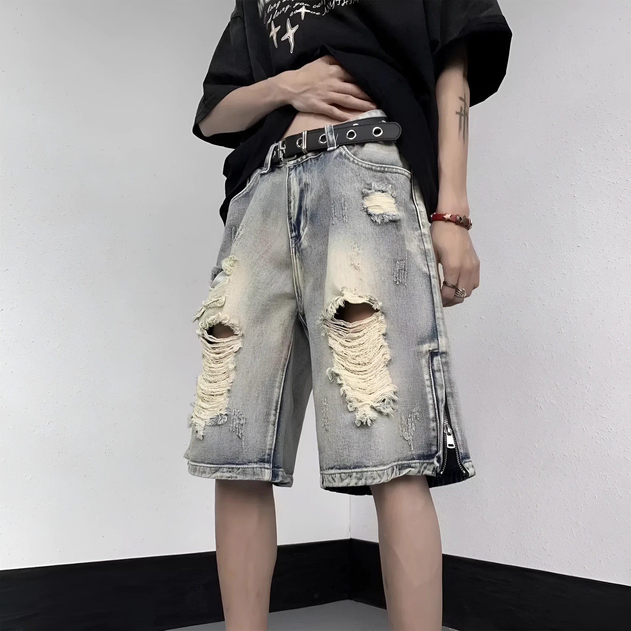 Blue retro tattered denim shorts with wide leg cut and loose fit for women