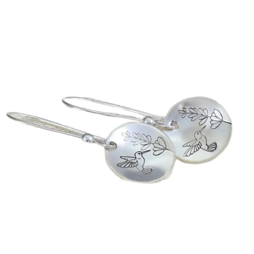 Silver zinc alloy earrings with bird, flower, leaf and zodiac designs in glossy round finish