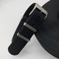 Woven nylon textile watch strap in army green colour showing integrated construction