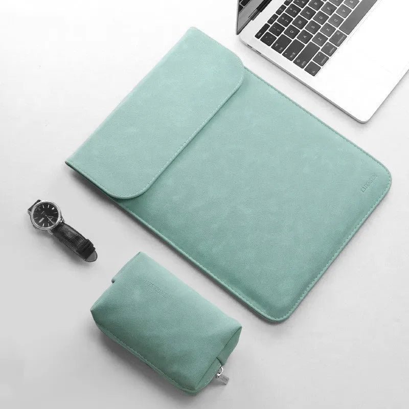 Fleece flanged laptop liner pack in black, green, grey, or pink, 11 to 15.6 inch size options