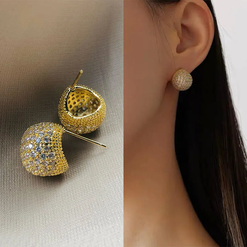 Geometric drop earrings with diamond-encrusted golden beans in gold or white