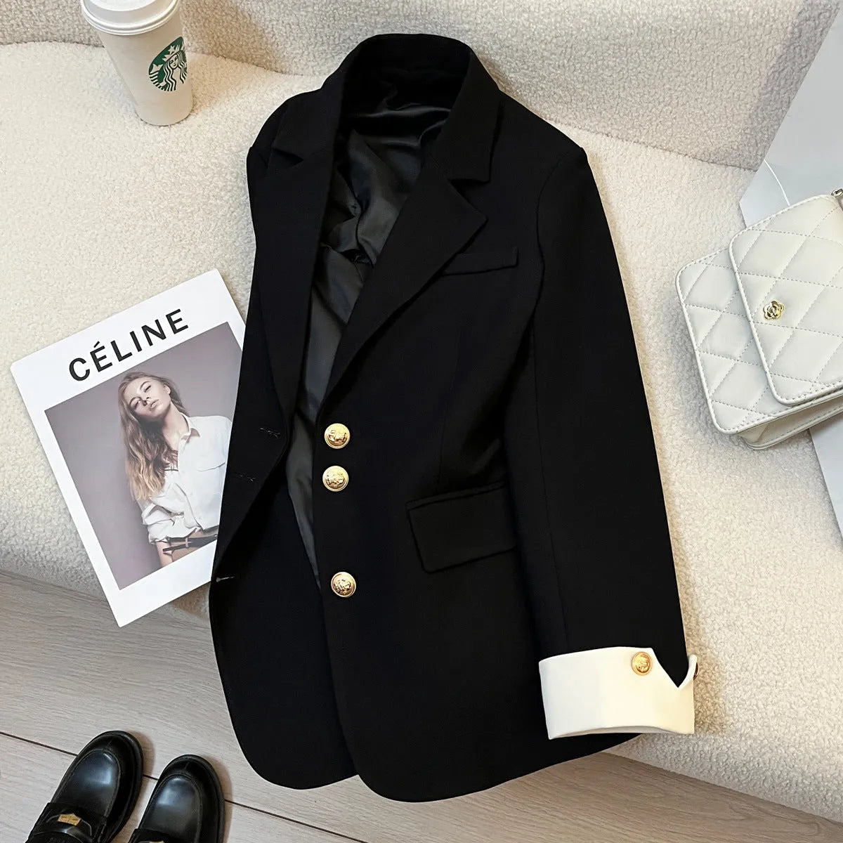 Women's loose-fit polyester commuting coat in milky white, showing long sleeves and pockets.