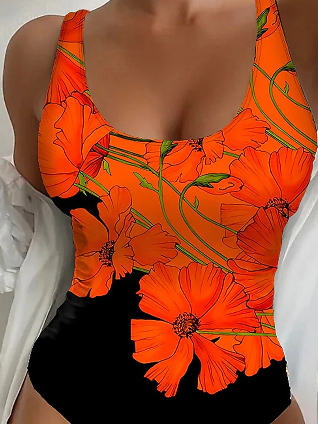 Orange floral print on a backless, slim-fit women's one-piece swimsuit