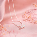 Silver cherry pendant necklace on a snake bone chain, adjustable from 21cm to 50cm.