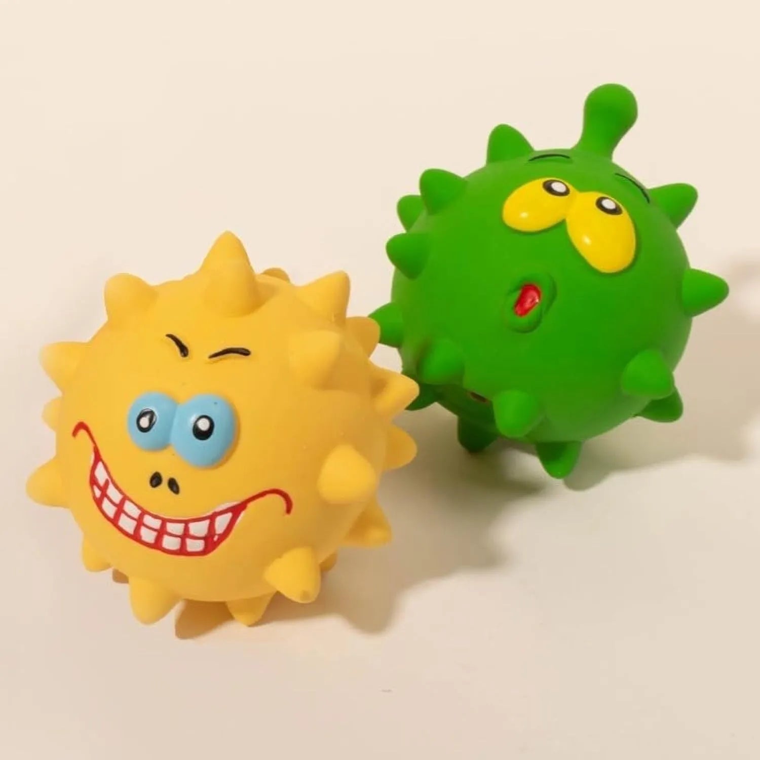 Four colourful natural latex rubber squeaky dog balls with cute faces design, 7.5cm diameter