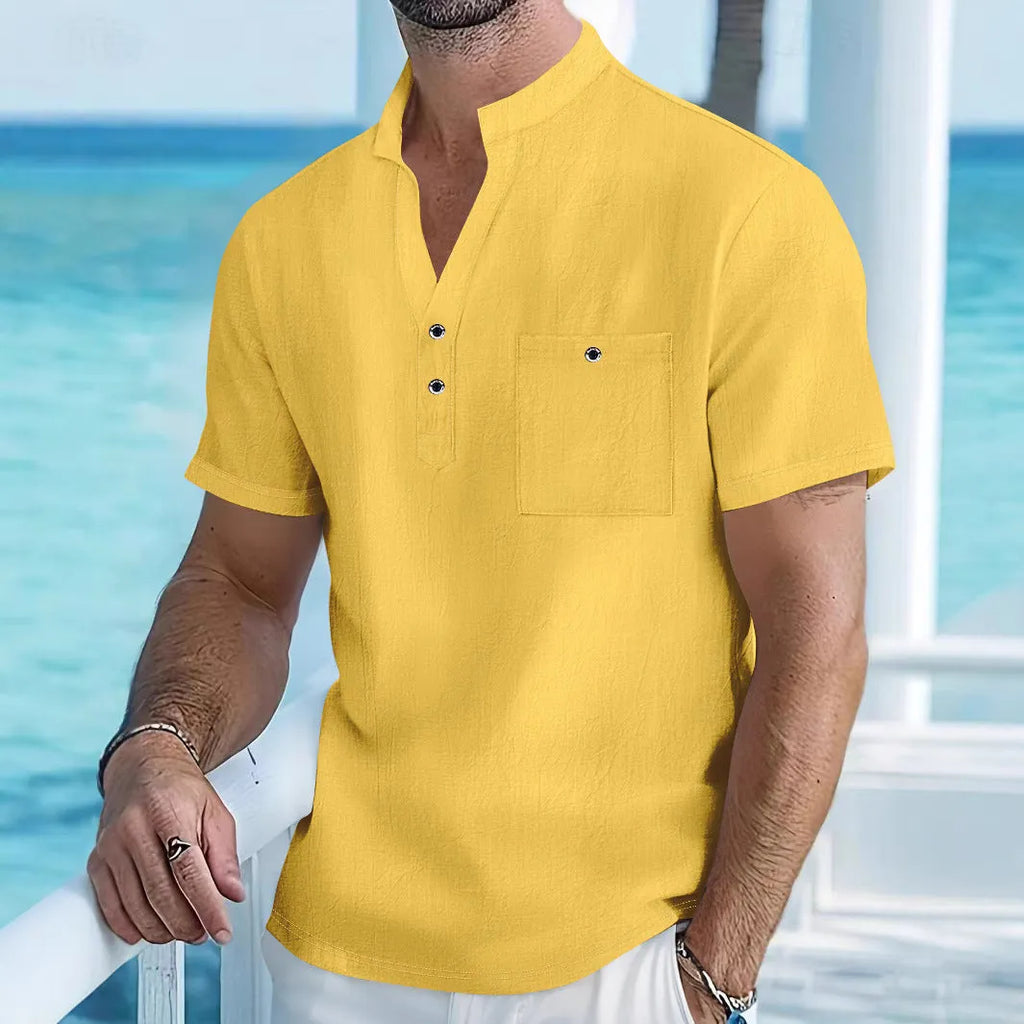 Men's light blue linen blend short sleeve t-shirt with a stand collar, shown in a loose fit.