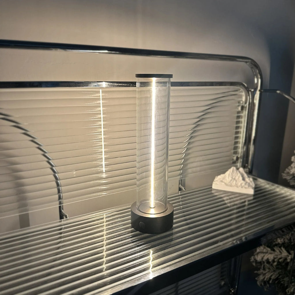 Modern circular glass LED night light with USB charging port and magnetic base