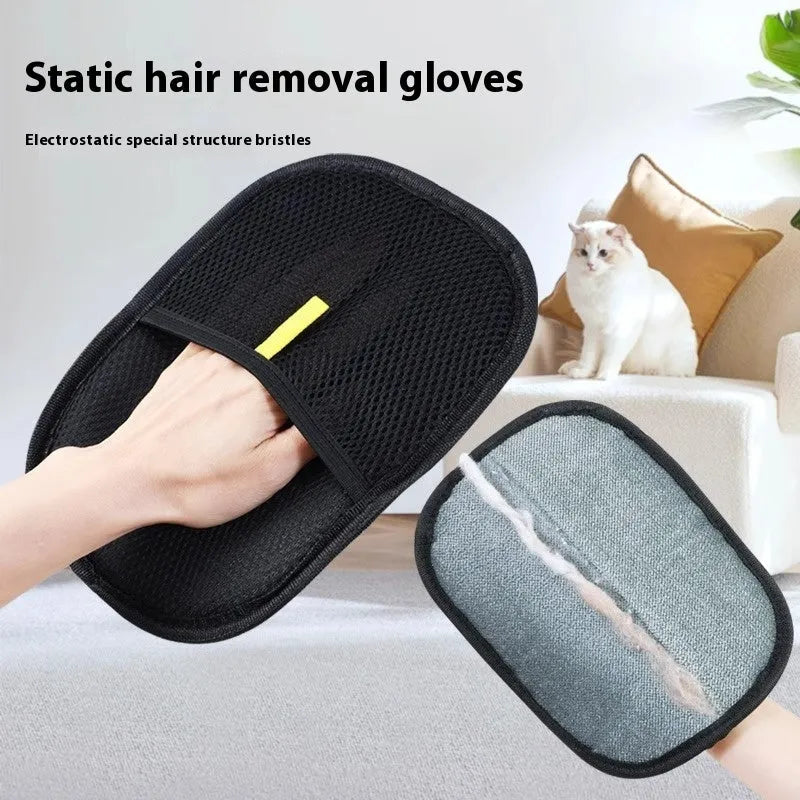 Black pet hair removal glove with silicone bristles on a hand, grooming a dog.