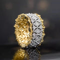 Geometric two-tone gold ring with round zircon detail on copper base