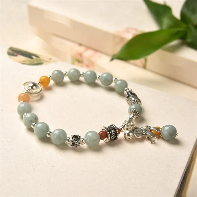 Natural emerald jade vintage bracelet with alloy fittings and retro styling