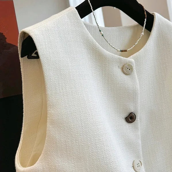 Women's sleeveless polyester bandage vest in milky white with round neck