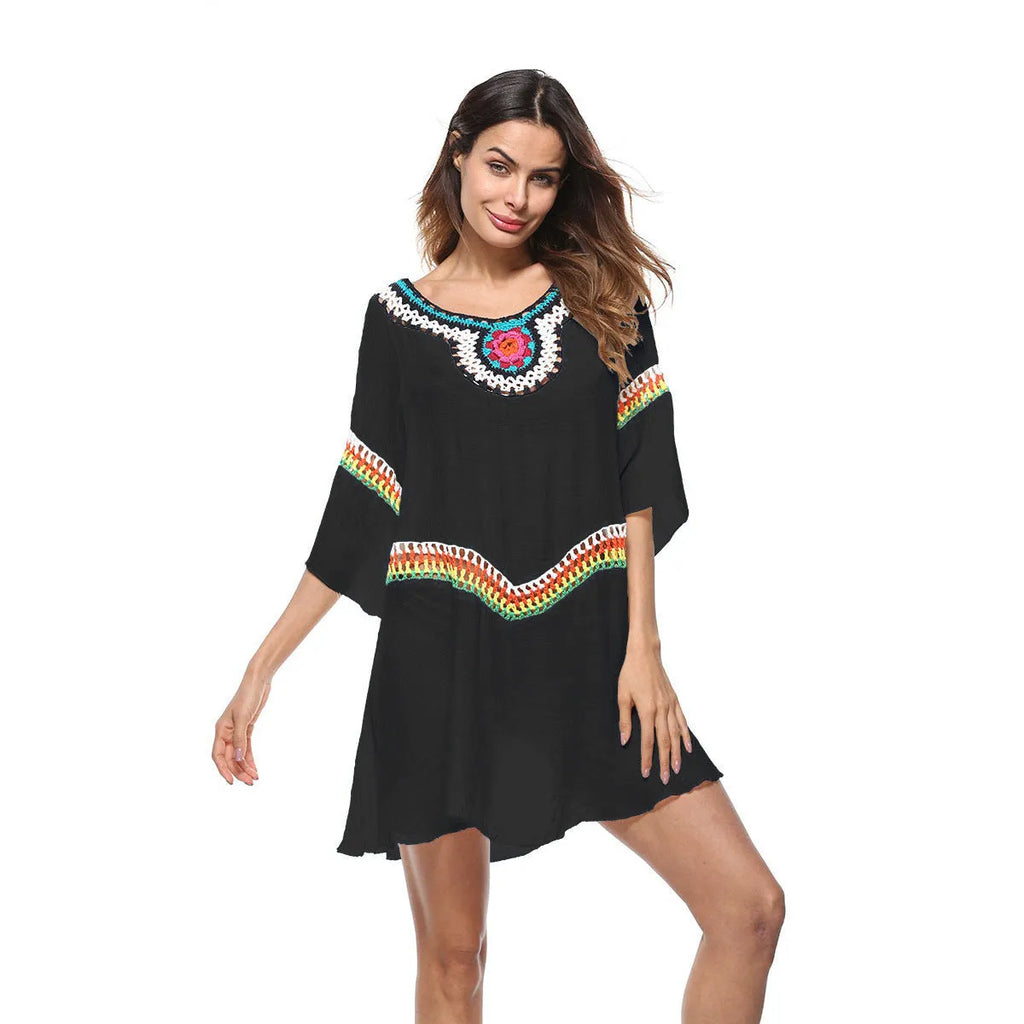 Crocheted ethnic-style beach cover-up for women in apricot colour, made from acrylic fabric.