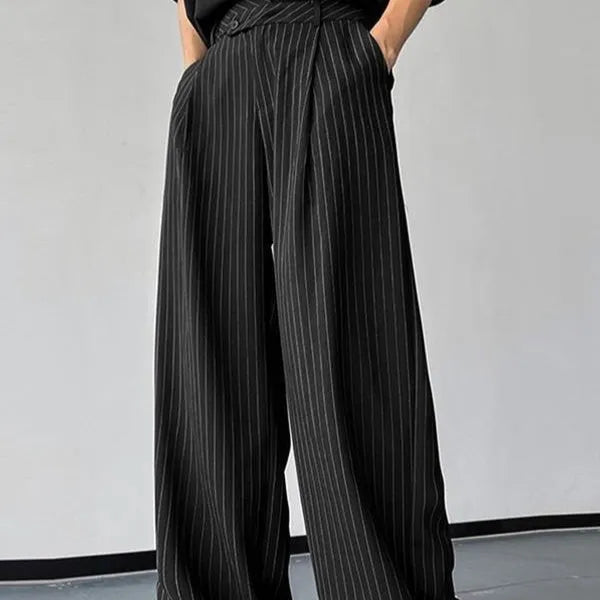 Men's black vertical striped pleated casual trousers with high elasticity fabric, laid flat.