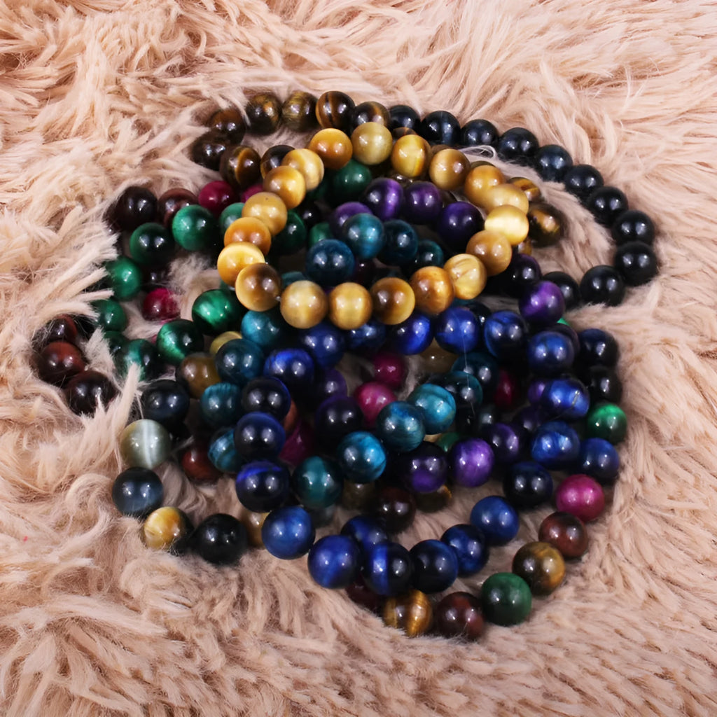 Natural tigereye crystal bracelet with round geometric beads on a wrist