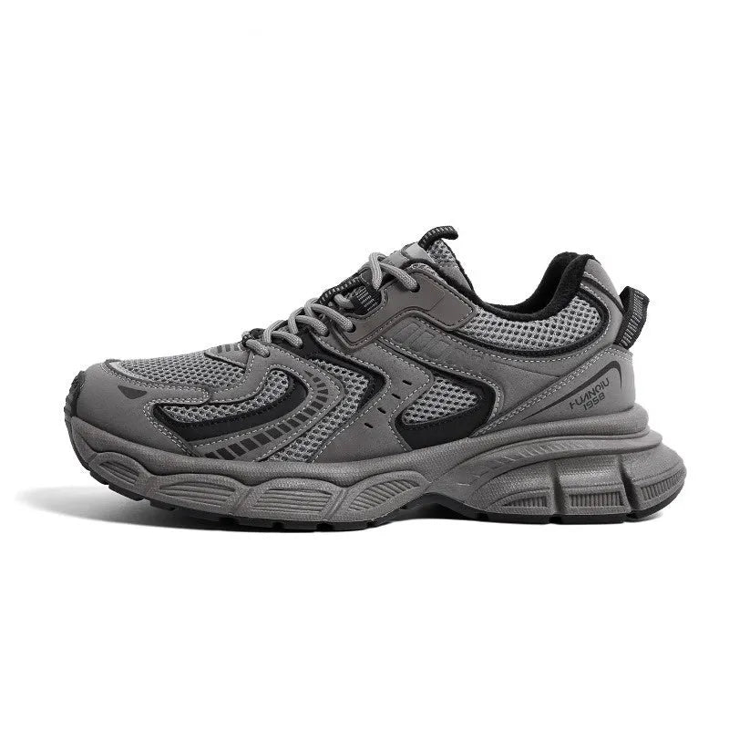 Low-top casual platform sneaker in grey with a round toe, leather stitching, and a flat 3-5cm heel.