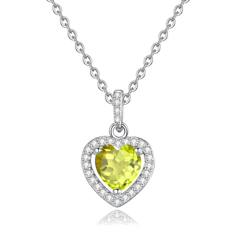 Sterling silver necklace with heart-shaped natural gemstone pendant on adjustable cross chain