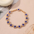 Flower-shaped bracelet with gemstone accents in gold or silver electroplated finish showing twelve colour combination options