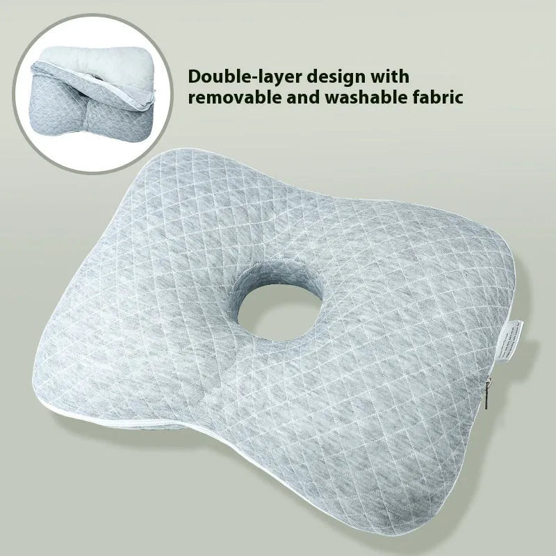 Beauty salon single hole ear pillow for adults in grey colour on a treatment bed.