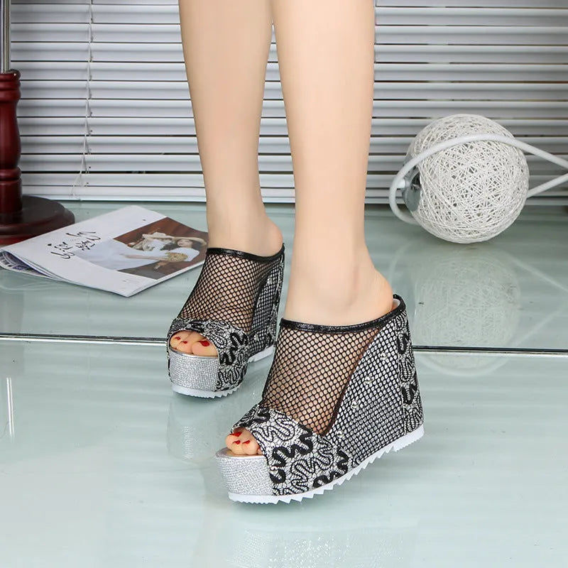 Korean style women's platform flip-flops with a hollowed-out chunky heel and mesh upper.