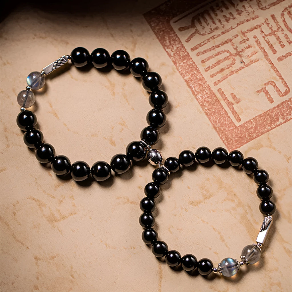 Obsidian Buddha beads couple bracelet set showing 8mm women's and 10mm men's sizing in national style