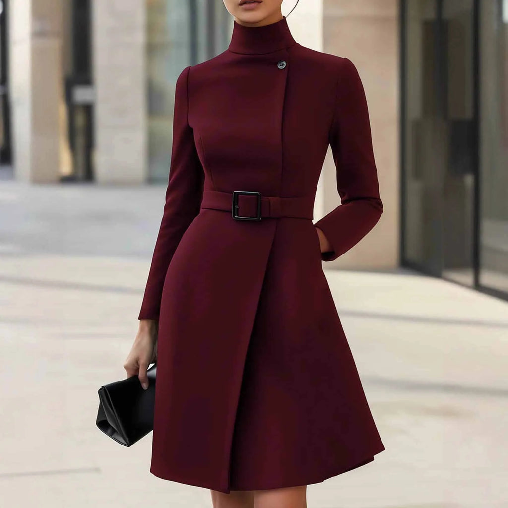 A woman's long sleeve Bohemian style dress with a high waist, stand collar, and zipper closure in black or wine red.