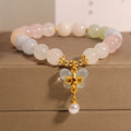 Women's crystal bracelet with colourful Morganite stone and butterfly pendant jewellery