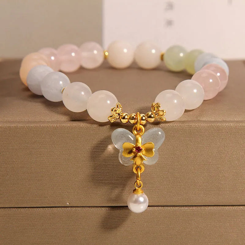 Women's crystal bracelet with colourful Morganite stone and butterfly pendant jewellery