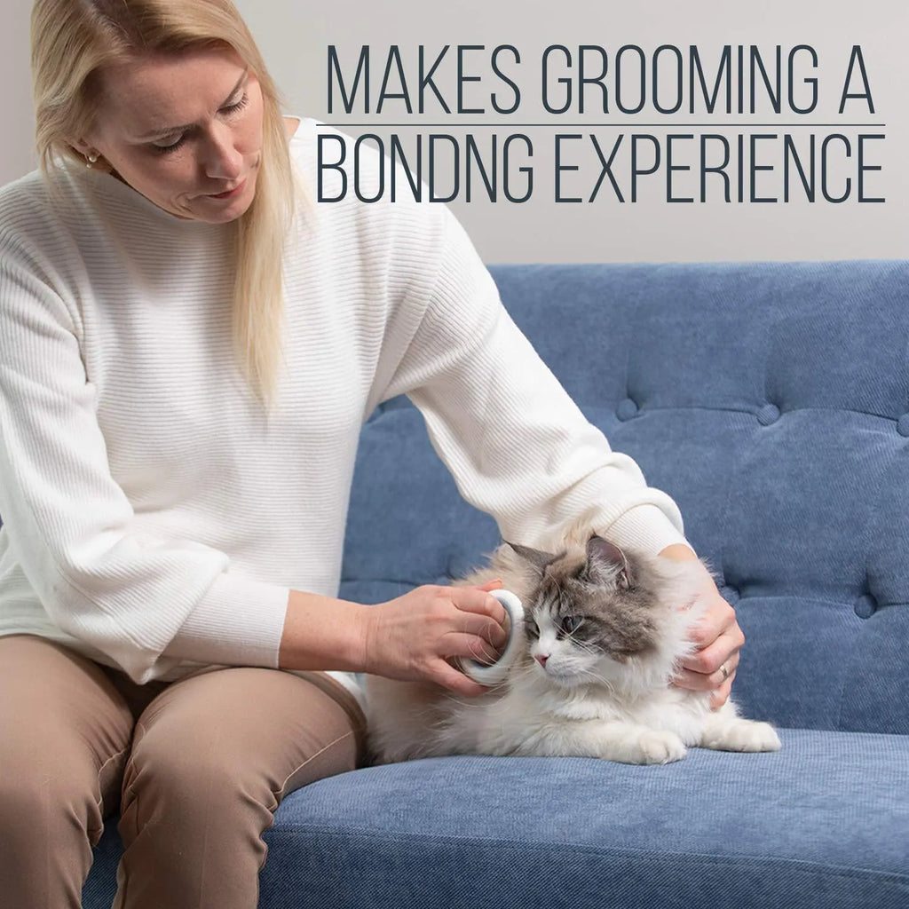 Blue pet grooming comb for deshedding and dematting cat and dog hair on a white background.