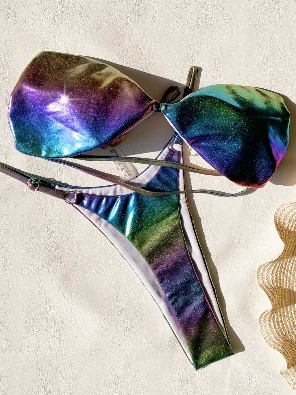 Women's gradient purple bikini swimsuit set on a white background.