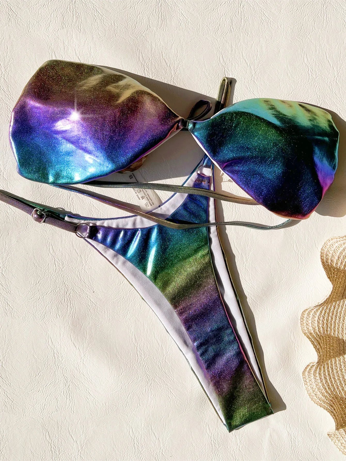 Women's gradient purple bikini swimsuit set on a white background.