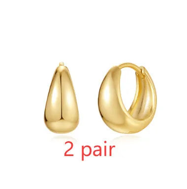 Geometric brass earclip earrings with round design in gold electroplated finish